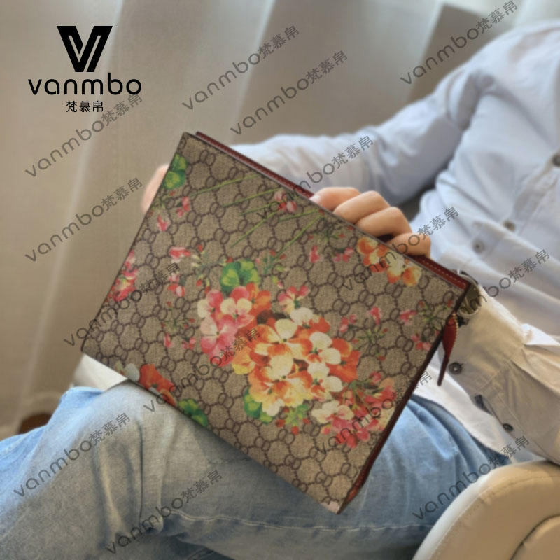 Europe and America 2022 new designer men's bag genuine leather handbag large capacity hand holding bag mobile phone wallet integrated bag man