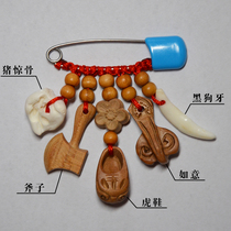 Singapore baby pin pendant peach wood pendant dog teeth real dog teeth shocking pig bones