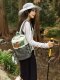 Outdoor travel backpack, large-capacity hiking and mountaineering bag, light travel storage, small school bag, leisure cycling backpack