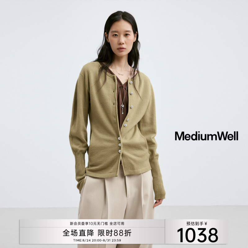 100% Merino Wool Cardigan with Lamb Leg Sleeves by Medium Well 100% Merino Wool Cardigan with Lamb Leg Sleeves by Medium Well