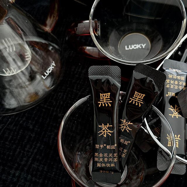 Xingshi Suoyu Black Tea Black Gold Flower Pu'Er Tangerine Peel Solid Beverage Pu'Er Tea Drink for Digestive Regulation and Fat Blocking