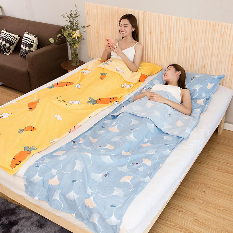 Travel to stay in the inhabited sleeping bag hotels in the dirty bed sheets covered by sleeping baby twin travel