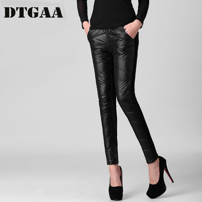 taobao agent DTGAA Women wearing down pants in winter slimming, thin and warm trousers, thick pants, middle waist pencil small feet pants