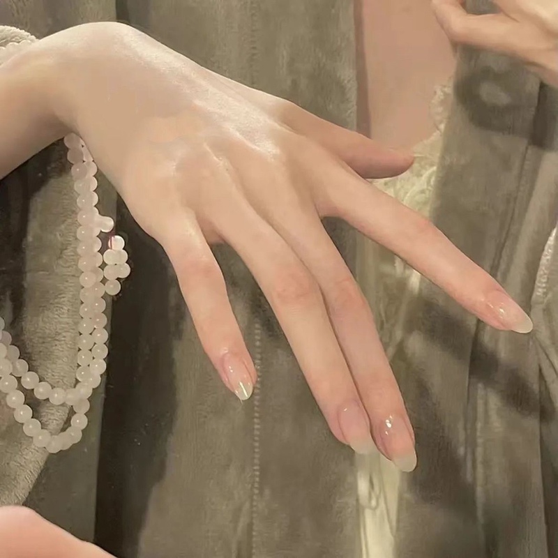 Simple Plain Water-Colored Nail Art, Similar to Hua Fei's Style, with a Touch of Guanlu Temple's Style, Featuring a Simple, Ice-Clear Nude Color