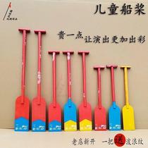 People rowing big boats props oars planks childrens dragon boat races mens dance boats performances paddle races stage