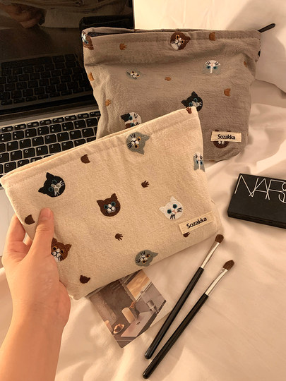 可爱猫咪化妆包女便携式大容量2025新款护肤品洗漱包旅行收纳袋小