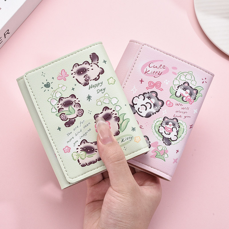 女性用三つ折り財布、ユニークでスタイリッシュ、かわいい漫画柄の小銭入れ、学生向けの短い折りたたみ式革財布/カードホルダー。