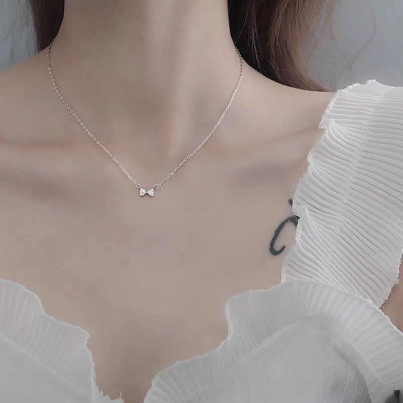 Japan-ROK light and luxurious 925 pure silver small crowddesign butterfly knot collarbone chain female fresh meritocratic and meritless temperament craze-Taobao