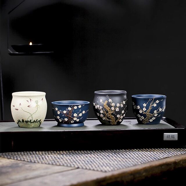 Yixing pure handmade purple sand dark fragrance plum blossom master cup smells the fragrance and tastes tea Kung Fu tea cup exquisite personal single cup