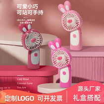 Portable handheld small fan cartoon mini electric fan wholesale USB charging desktop student printed LOGO fan