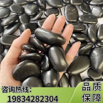 Liaoning black pebbles large and small black stone courtyard paving paving garden landscaping natural rain flower stone plain