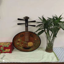 Musical instrument Yueqin folk music red wood flowers pear wood pluccet Nguyen hand painted wall decorated with decorative shooting props brown