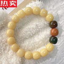 Qiwangmei Milka three-top Bodhi bracelet wrapped around the finger of a soft girl with white jade Bodhi roots and playing with Bodhi seeds Buddha beads and rosary beads.