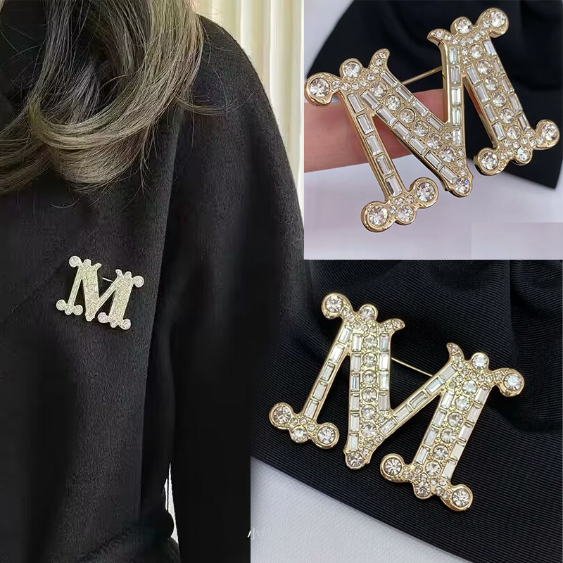 Great clothes partner upscale brooch female M letters Paris Designers to build a refined temperament fashion accessories-Taobao