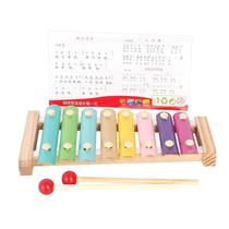 Boy girl child baby orff music player playing piano