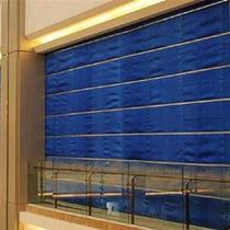 Liaocheng fire-proof rolling shutter composite material double-track double curtain folding lifting curved inorganic cloth fire-proof rolling shutter door