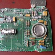 Broken board with a gold-sealed iron cap and a high-end op amp