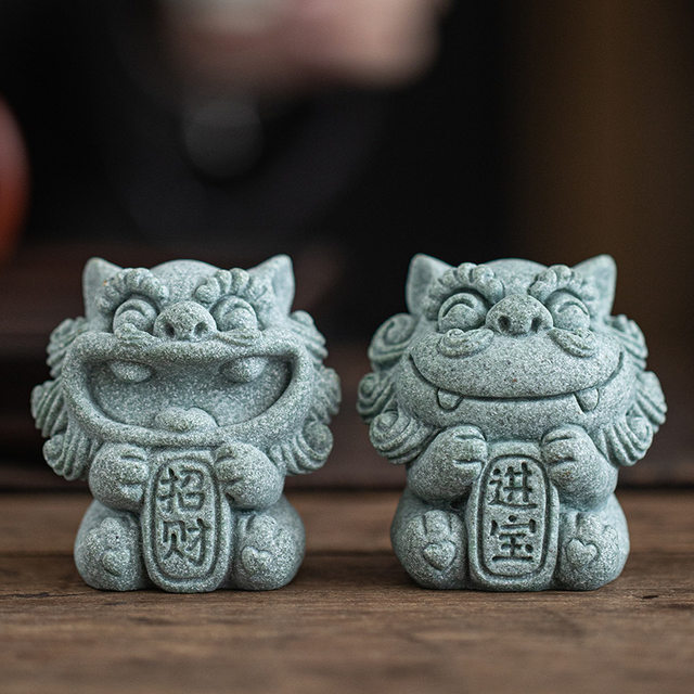 A Pair of Cute Green Sandstone Wind Lion Statues, a National Trend Stone Lion, a Lucky Charm, Tea Pet Ornament, and Souvenir