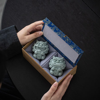 A Pair of Cute Green Sandstone Wind Lion Statues, a National Trend Stone Lion, a Lucky Charm, Tea Pet Ornament, and Souvenir