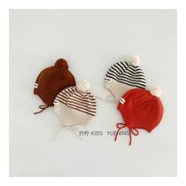 Factory sells Korean fashionable childrens knitted hats fashionable baby striped fur ball ear protection hats cute childrens lace-up fur