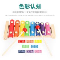 Infant children wooden vocalist plays the wooden musical instruments tailored to the wooden music instruments