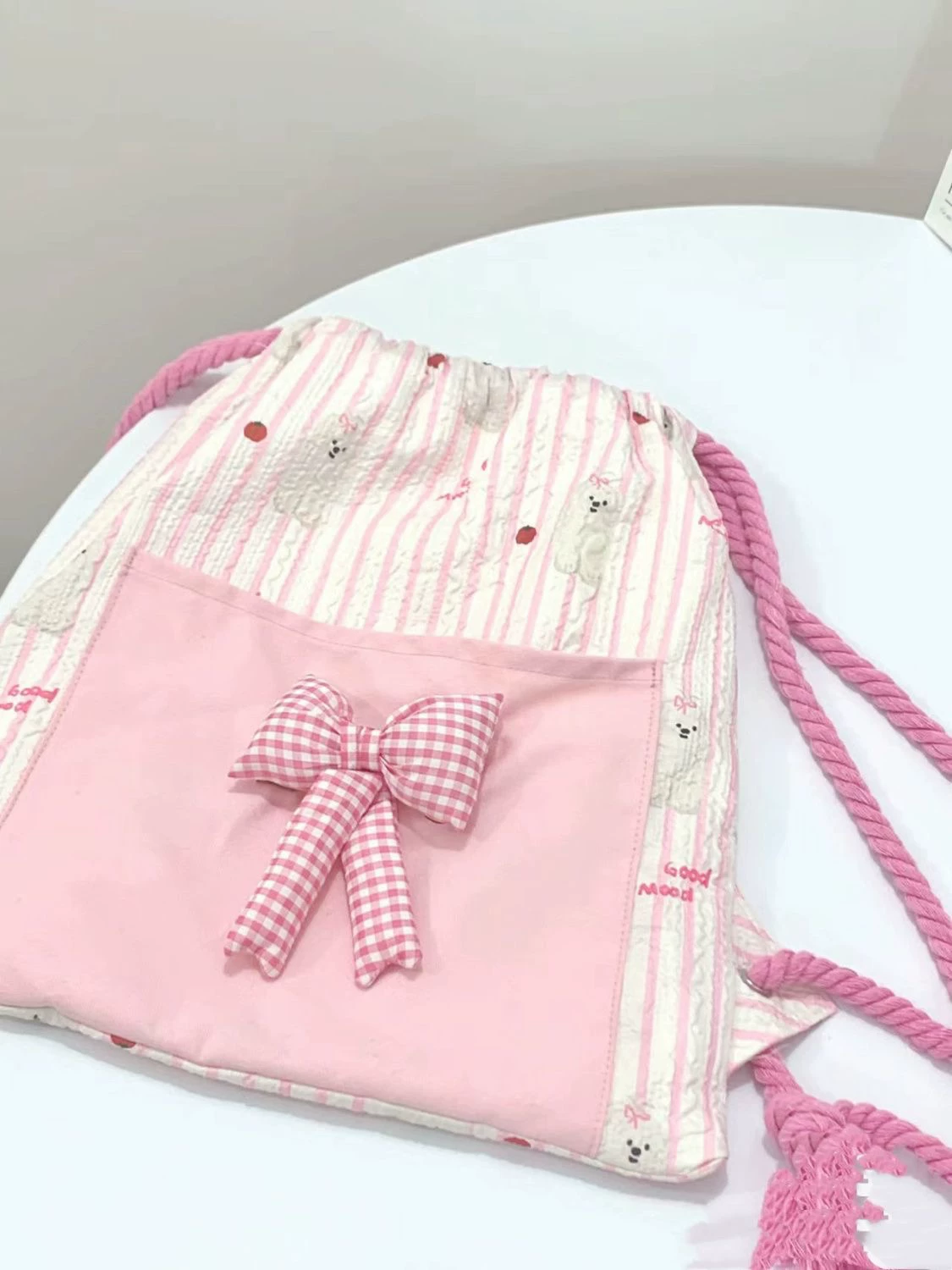 Cartoon backpack with bow, capacious storage bag, drawstring