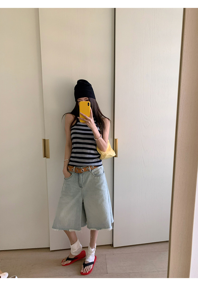 Стильные женские джинсы средней длины с эффектом потертости 牙套大汪