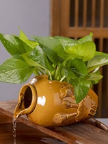 Fish tank filter earthen pot flowing water pouring bottle pouring can creative flowing water tank copper money grass flower pot fish tank flowing water circulation ornaments