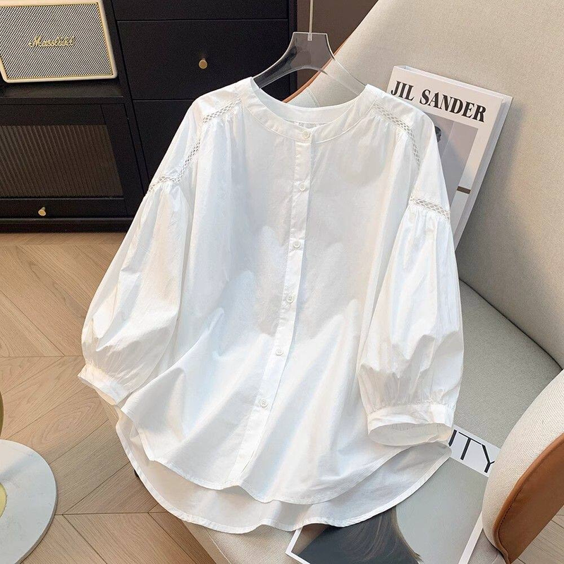 French-Style Round-Neck White Shirt for Women with Lantern Sleeves, Loose Fit, Hollow Embroidery, and Elegant Design French-Style Round-Neck White Shirt for Women with Lantern Sleeves, Loose Fit, Hollow Embroidery, and Elegant Design
