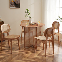 Nordic retro solid wood dining table and chair combination Japanese-style household round rattan dining table Wabi-sabi style solid wood rattan dining table