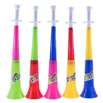 Night market street stalls sell childrens double-section large speakers. Baby oral muscle training cheering props plastic speakers