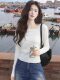 French style irregular one-line collar black long-sleeved sweater for women in autumn and winter slim-fitting bottoming sweater top