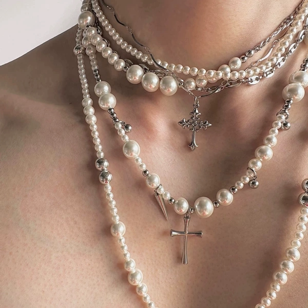 Cueva's original design "Disordered" pearl titanium steel long necklace offers multiple ways to wear it.