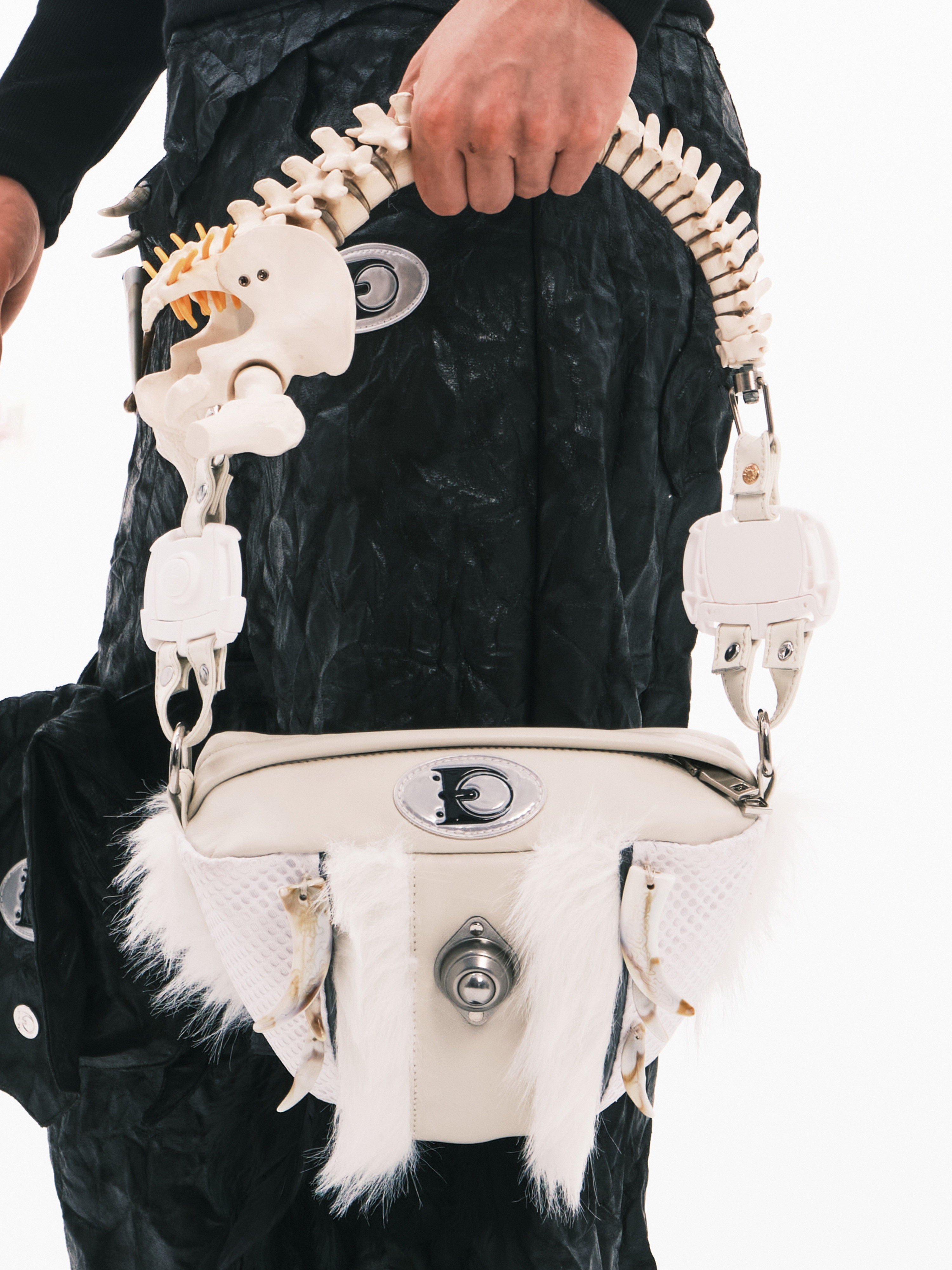 Embryo resin artificial bone bag, long-haired genuine leather 