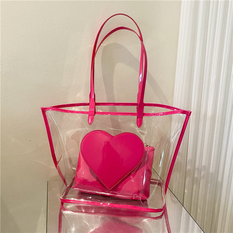 New summer style transparent jelly shoulder bag for college students, large capacity, color-blocked heart-shaped mother and daughter bag.