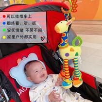 The wind chime comfort seat coaxes the baby to play with the toy in the car the bed artifact and the safe baby pendant lies in the back seat of the car.