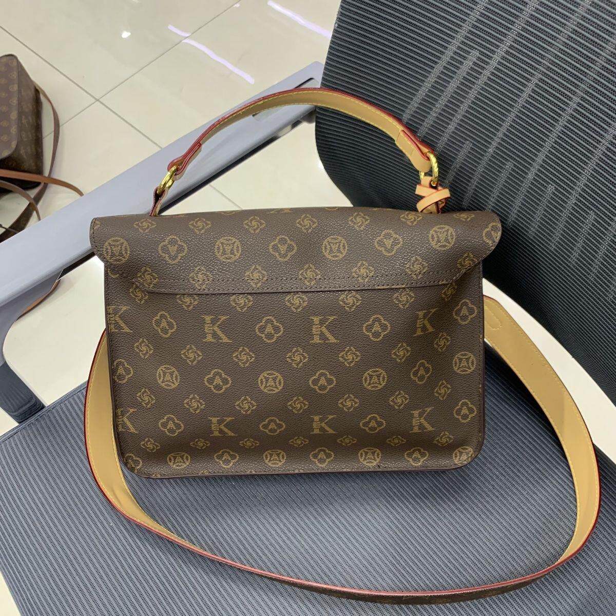 чемодан 手提斜挎两用女包2025新款女包高级时尚百搭邮差包单肩老花大容量