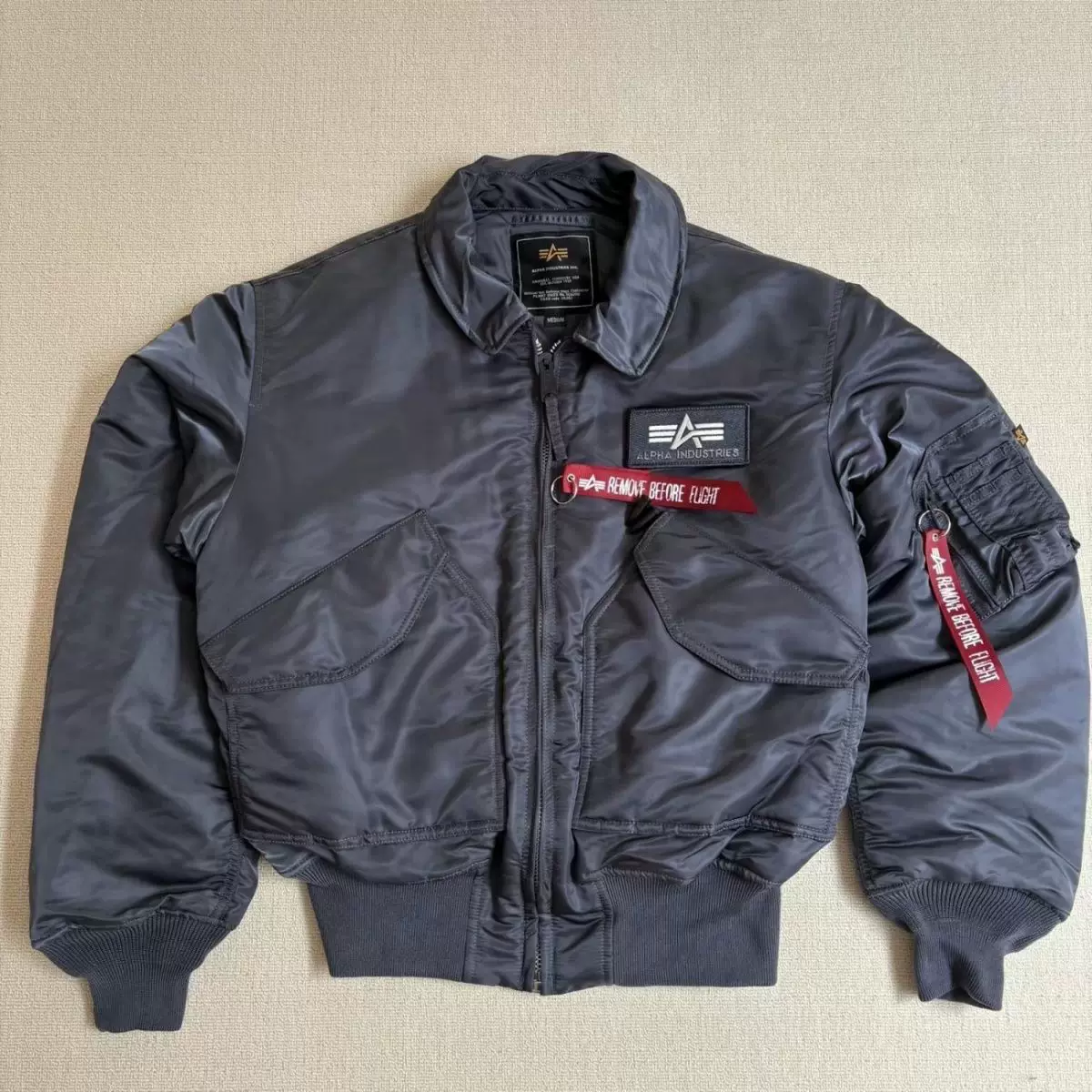 Кроссбордера Alpha industries Alpha CWU 45P куртка военного типа бортовая куртка