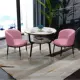 Розовый один стол и два стула