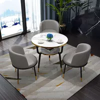 Светло -серый один стол и три стулья