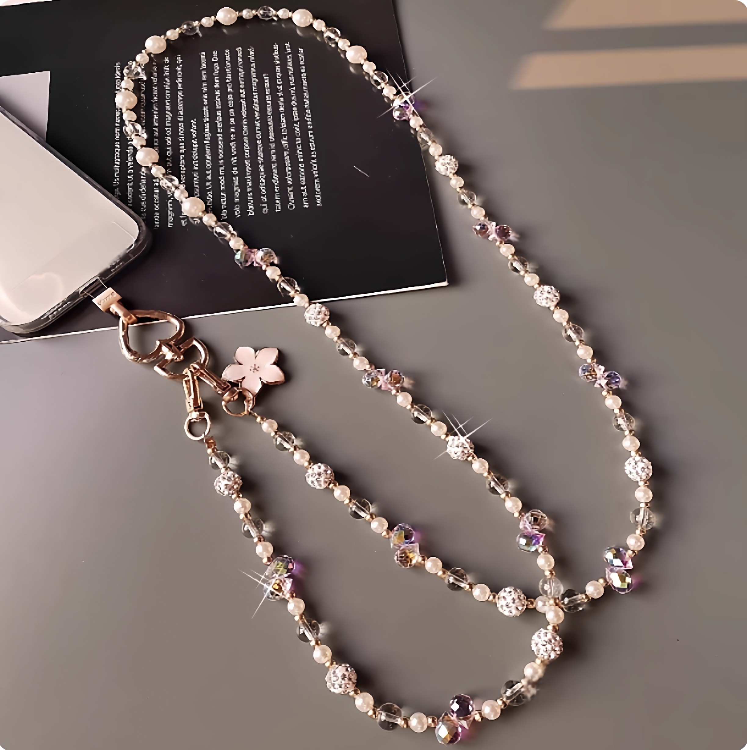 Long crossbody phone strap with pearl and crystal chain, stylish and high-end bag with a sturdy bee chain.