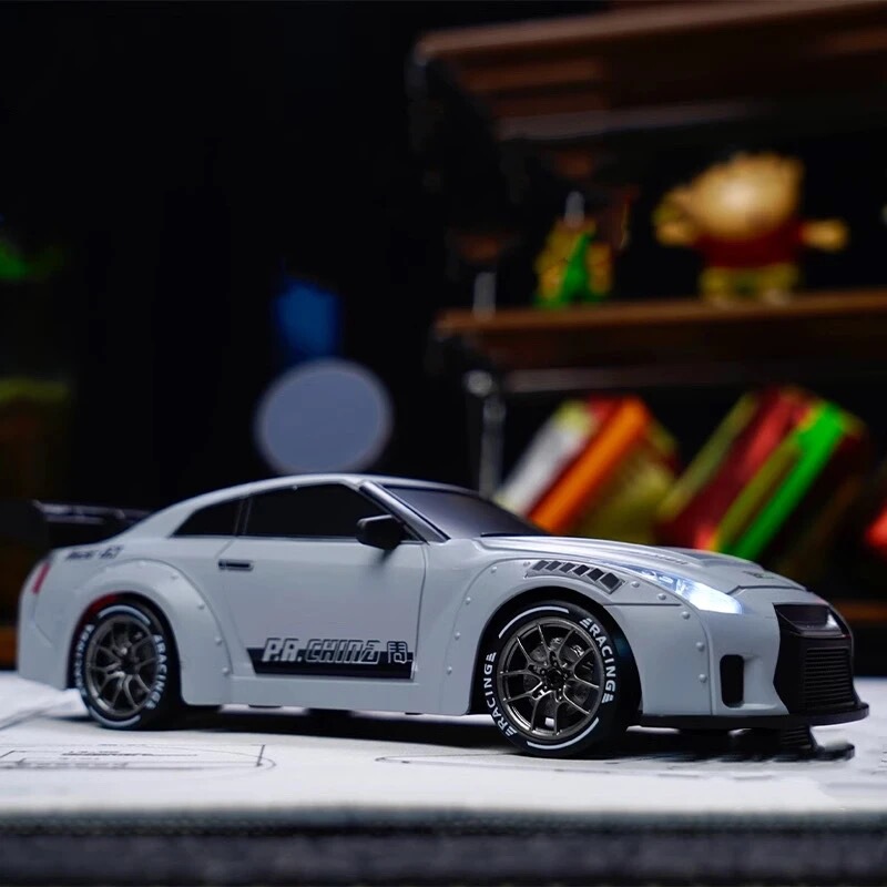 High-Speed Drift Remote Control Car Gtr with Proportional Throttle and Gear Adjustment for Boys to Play with High-Speed Drift Remote Control Car Gtr with Proportional Throttle and Gear Adjustment for Boys to Play with