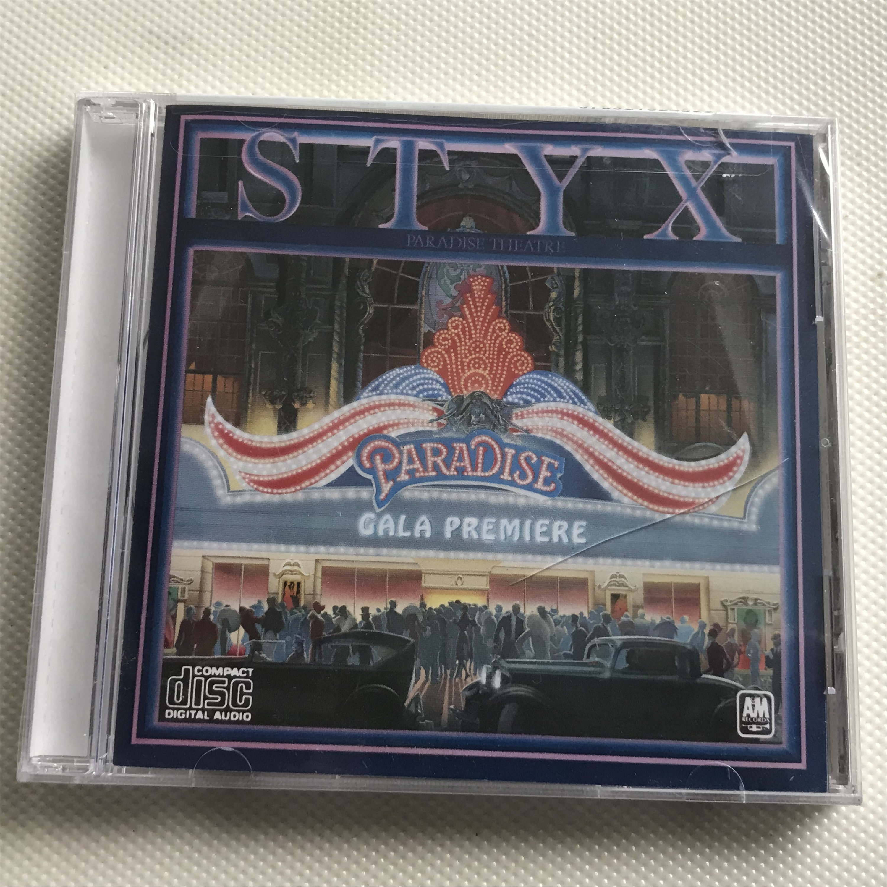 Версия Styx Paradise Theatre M Нераспечатанная коробка для компакт-дисков с трещинами
