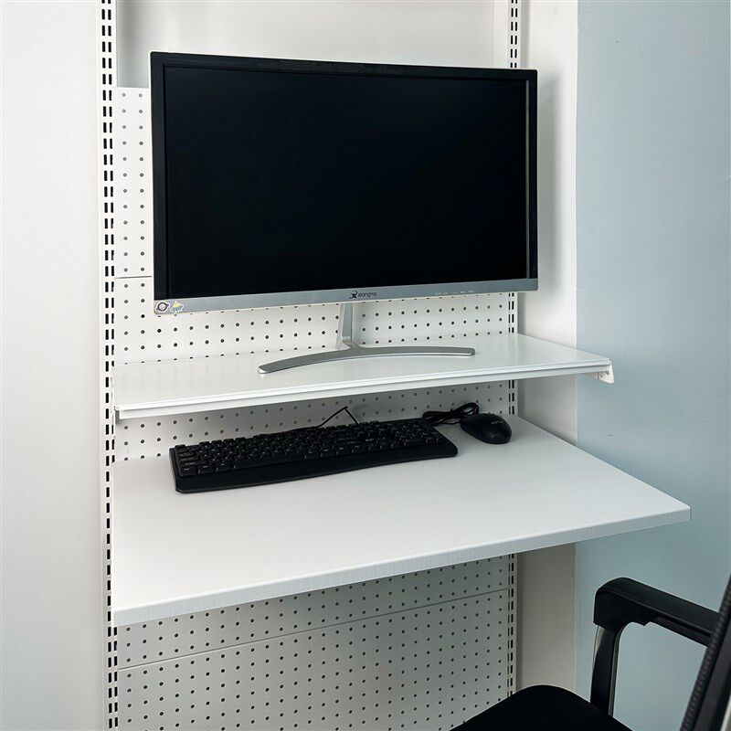Perforated board bookshelf floating tabletop