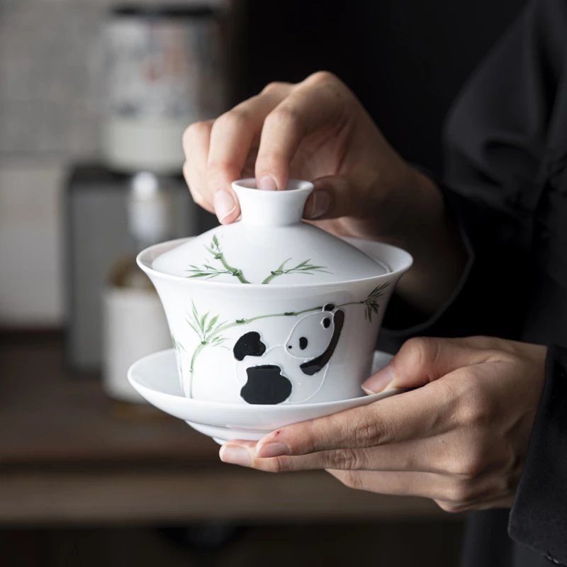 White porcelain hand-painted panda playing with bamboo Sancai bowl teahouse literati ceramic kung fu tea bowl Sichuan and Sichuan culture tea set