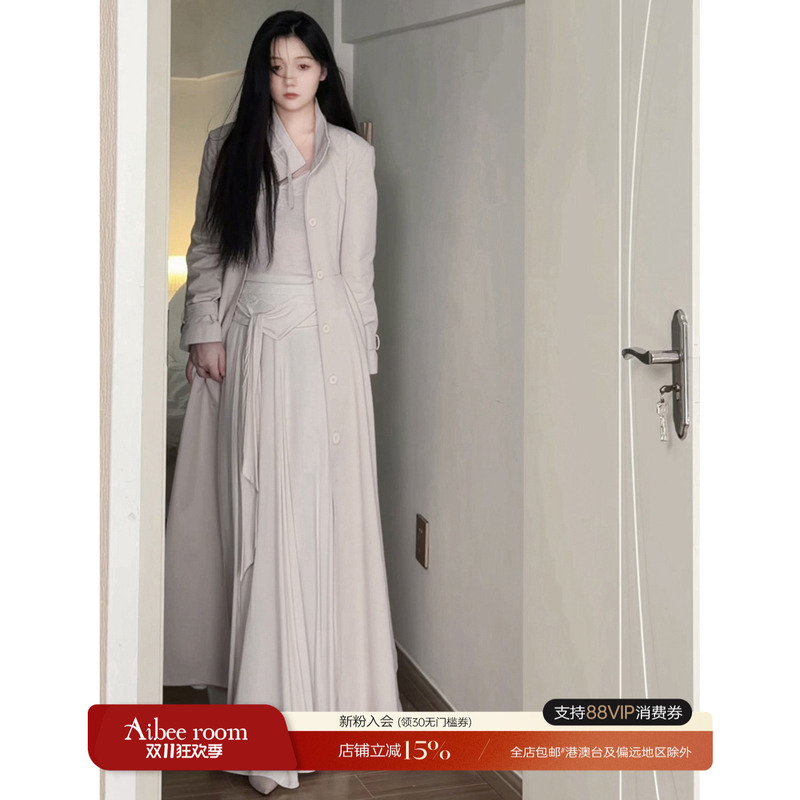 Sun Xiaoju's "Birth Year Skirt" Is a Tie-Waist, Flowing Umbrella-Hem Midi Skirt for Women, with an Autumn Vibe and a Large, Long Skirt