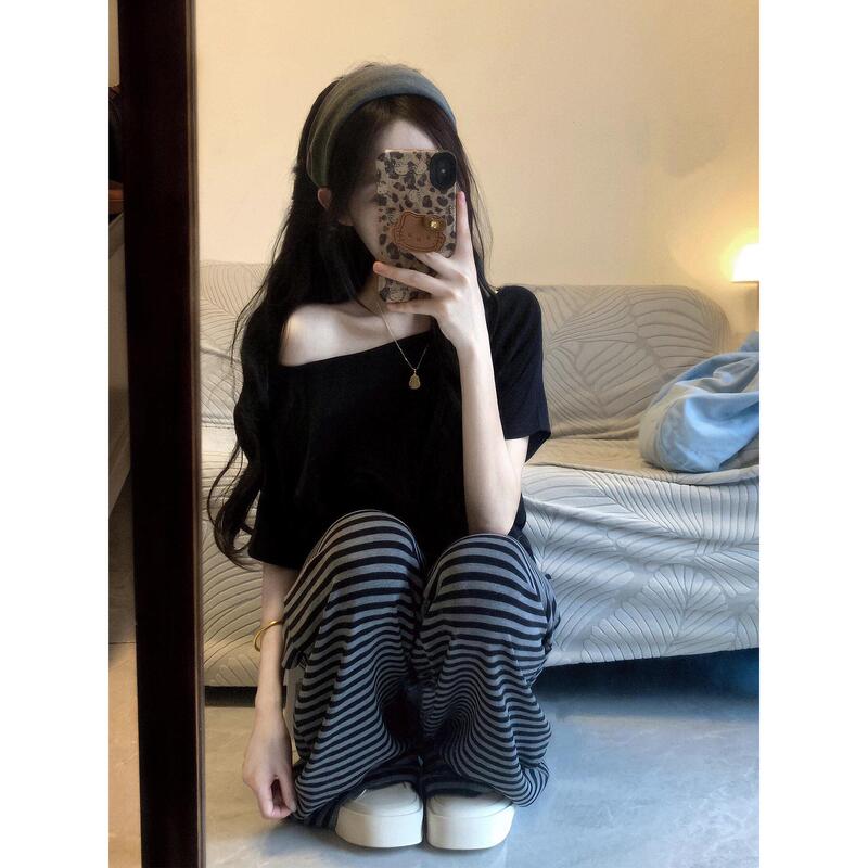 Casual and Stylish Summer Outfit for Women, Featuring a Slim-Fit Off-Shoulder T-Shirt and Striped Pants in a Youthful Style