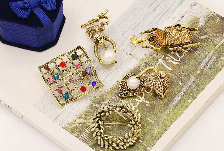 Châu Âu và Hoa Kỳ retro cá tính mới ngọc trai hoang dã động vật trâm cài áo khoác sườn xám đơn giản phụ kiện pin trâm cài áo hàn quốc