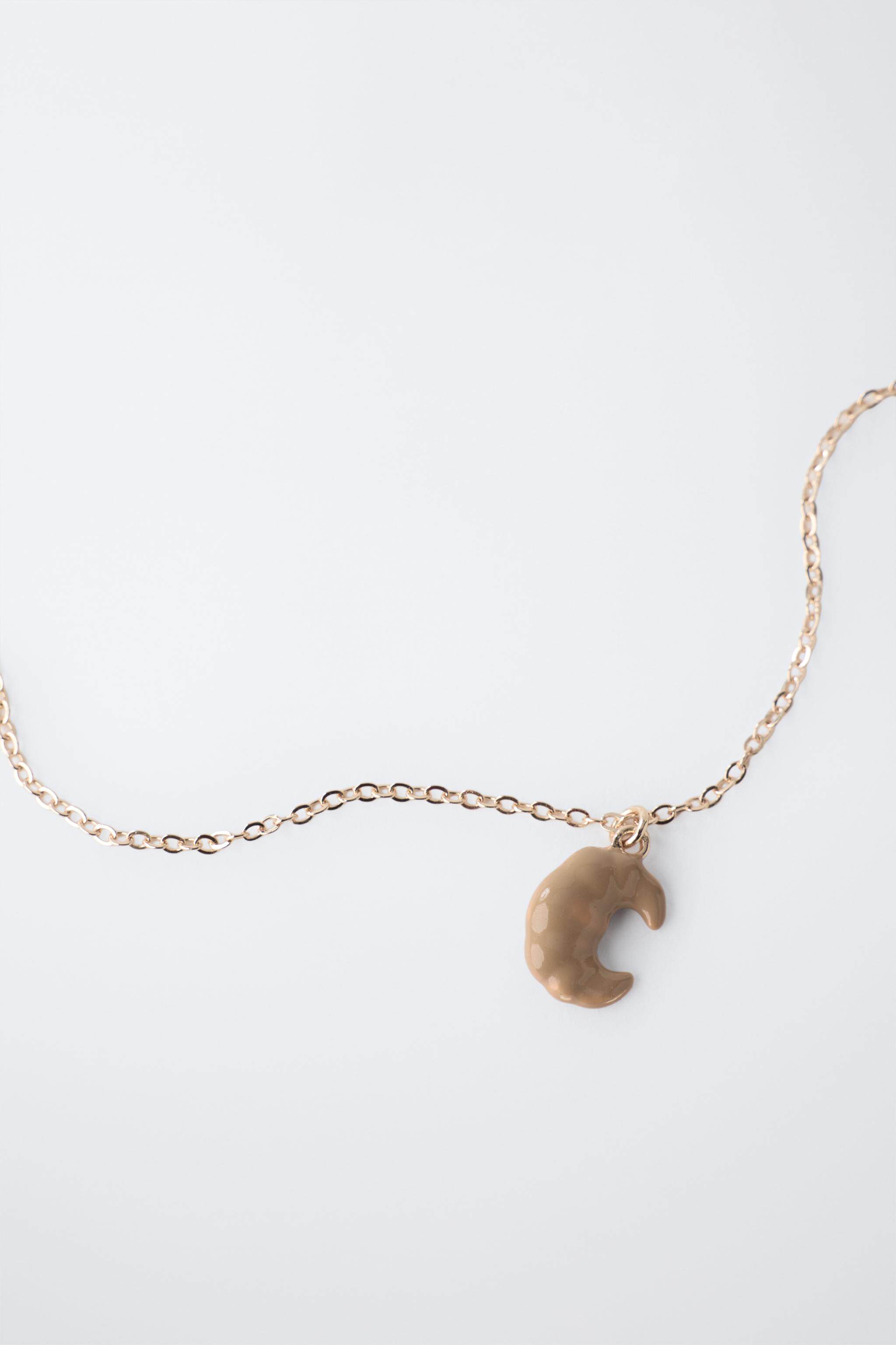 Ожерелье zara2026春夏新品 童装 两条套装羊角面包吊坠项链 0441645 303