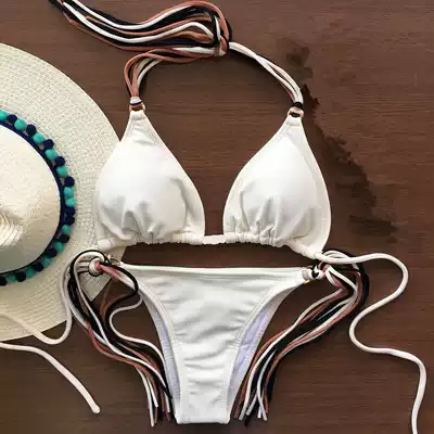 2019 New hollow rope tassel sexy triangle soft bag solid color bikini European and American swimwear foreign trade swimwear